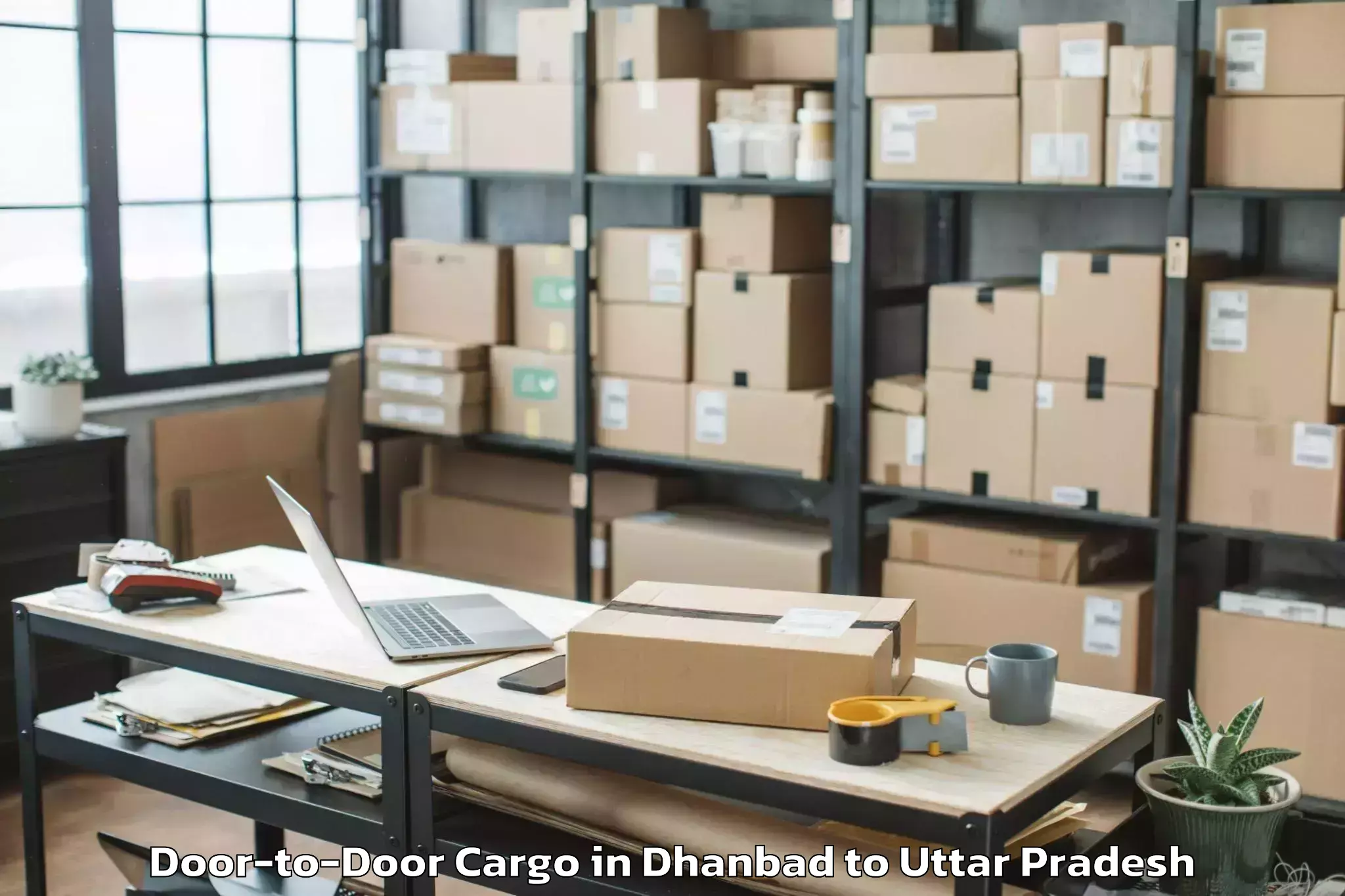 Book Dhanbad to Raura Door To Door Cargo Online